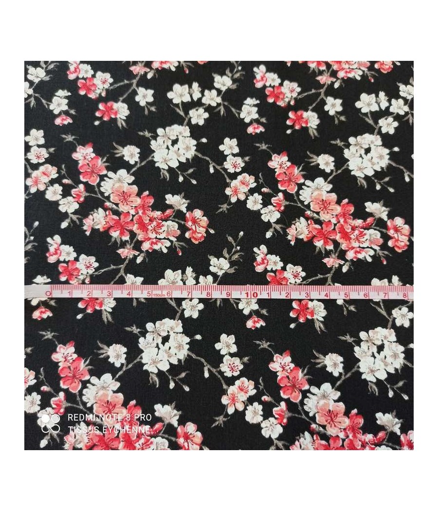 Tissu coton fleuri noir à motifs blancs à petit prix - Cuirtex